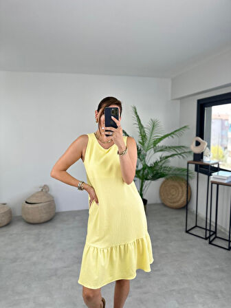 Yonca Moda Evi Kadın Bürümcük Kumaş Eteği Fırfır Detaylı Sıfır Kol Elbise