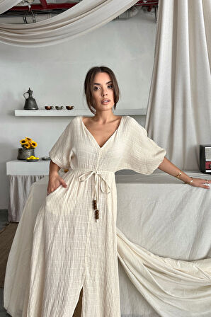 Yonca Moda Evi V YAKA BEL BONCUK BAĞLAMALI MÜSLİN ELBİSE YIRTMAÇ DETAYLI - Ekru