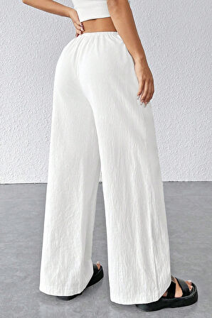 Kadın Beyaz Bol Kesim Cepli Geniş Paça Dökümlü Pantolon