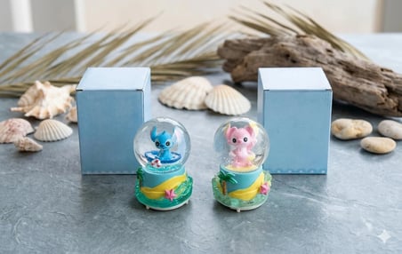 Masaüstü Işıltısı: 11 cm Melodili Pembe & Mavi Kar Küresi İkilisi(dilediğiniz notu hediye paketi üzerine yazılı şeklinde gönderim yapılmaktadır)