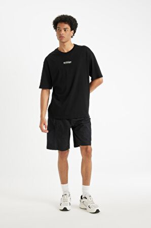 DeFacto Rick and Morty Boxy Fit Bisiklet Yaka Pamuklu Sırt Baskılı Kısa Kollu Tişört C6511AX24AUBK81