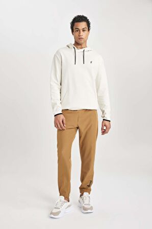 DeFactoFit Dokuma Esnek Multifonksiyonel Sporcu Jogger Eşofman Altı Slim Fit Dar Kesim Çift Cepli C1212AX24SPKH457