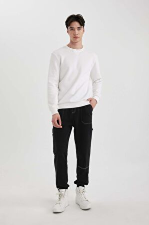 DeFacto Regular Fit Jogger Eşofman Altı Beli Bağcıklı Lastikli Paça Cepli C5384AX24SPBK81