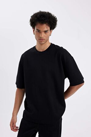 DeFacto Loose Fit Bisiklet Yaka Kısa Kollu Ağır Kumaş Basic Düz Siyah Tişört B4844AX24AUBK81