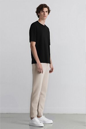 DeFacto Jogger Düz Paça Her Yöne Esneyen Yazlık Kumaş Pantolon T6317AZ25SPBG609