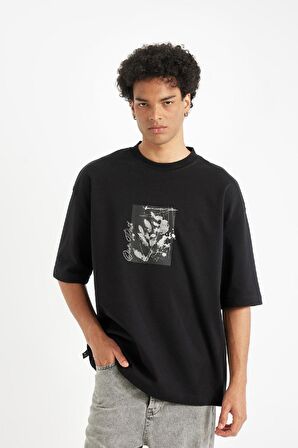DeFacto Siyah Loose Fit Bisiklet Yaka Çiçek Baskılı Ağır Kumaş Kısa Kollu Tişört C7056AX24AUBK81