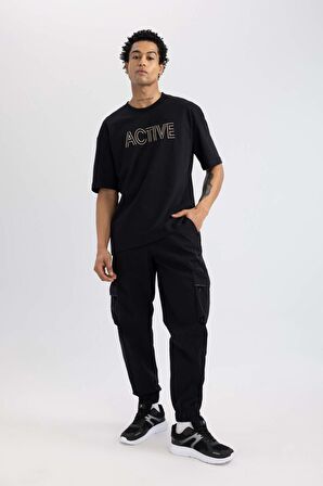 DeFactoFit Oversize Geniş Kalıp Kargo Cepli Sporcu Dokuma Pantolon C1528AX24SMBK81