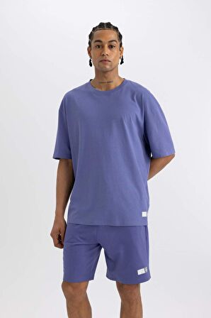 DeFactoFit Slim Fit Dar Kesim Cepli Baskılı Sporcu Şort A1625AX24SMPR484
