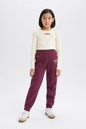 DeFacto 	Kız Çocuk Standart Fit Beli Paçası Lastikli Baskılı Jogger Eşofman Altı D2295A824WNBR306