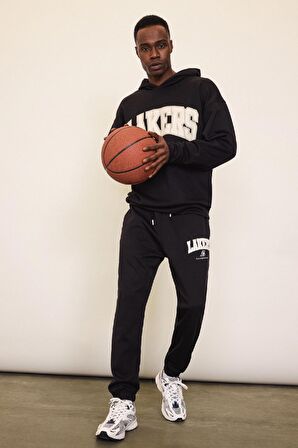 DeFactoFit NBA Los Angeles Lakers Jogger Eşofman Altı Standart Fit Cepli Esnek Bantlı Paça Skuba Dalgıç Kumaş D6723AX25SPBK82