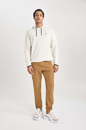 DeFactoFit Dokuma Esnek Multifonksiyonel Sporcu Jogger Eşofman Altı Slim Fit Dar Kesim Çift Cepli C1212AX24SPKH457