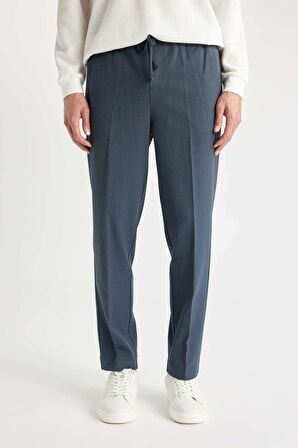 DeFacto Yazlık Kumaş Jogger Pantolon Beli Bağcıklı Lastikli Düz Paça Cepli Her Yöne Esneyen A9943AX24AUNV125