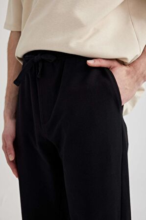 DeFacto Regular Fit Cepli Düz Paça Eşofman Altı B0593AX24SPBK81