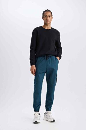 DeFactoFit Sporcu Jogger Eşofman Altı Standart Fit Üç Cepli Beli Bağcıklı Lastikli Paça D3741AX24WNBE821