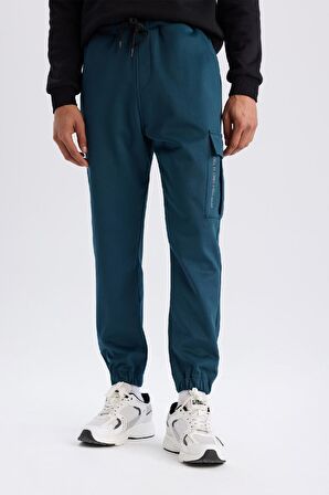 DeFactoFit Sporcu Jogger Eşofman Altı Standart Fit Üç Cepli Beli Bağcıklı Lastikli Paça D3741AX24WNBE821