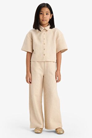 DeFacto Kız Çocuk Beli Lastikli Wide Leg Geniş Bol Paça Bürümcük Pantolon E1103A825SPBG286
