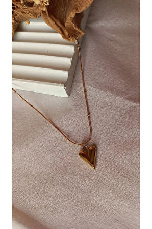 Dorikalı Bombeli Kalp Kararmaz Çelik Gold Kolye