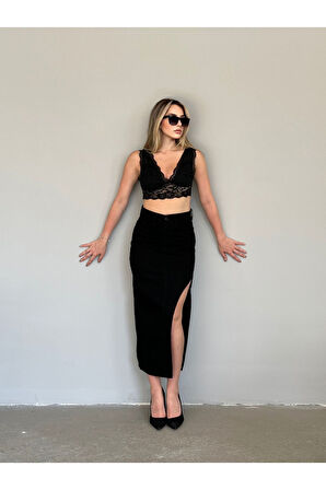 KADIN SİYAH UZUN ÖN PARÇALI  ASİMETRİK KOT ETEK