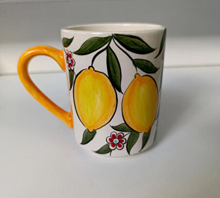 El yapımı limon desenli seramik kupa