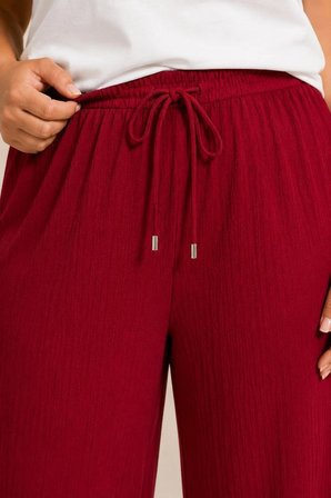 Kadın Battal Beden Bürümcük Kumaş Beli Lastikli Bağcıklı Bol Paça Palazzo Pantolon - Bordo