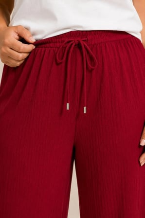 Kadın Battal Beden Bürümcük Kumaş Beli Lastikli Bağcıklı Bol Paça Palazzo Pantolon - Bordo