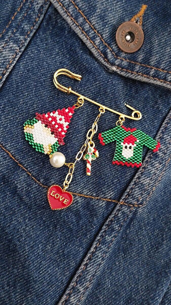 Eva Broş, Yaka İğnesi, Rozet